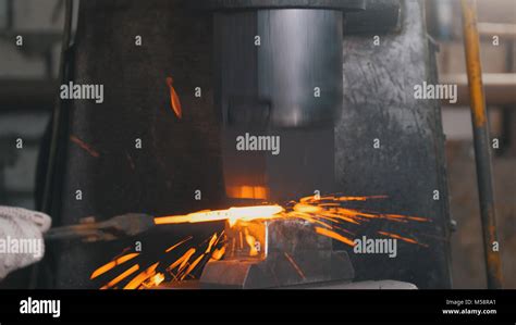 Automatic Hammering Blacksmith Forging Red Hot Iron On Anvil Extreme Close Up Stock Photo Alamy