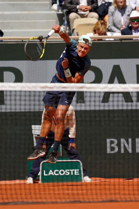 Professional Tennis Player Holger Rune Of Denmark In Action During His