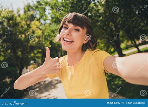 Photo Of Sweet Excited Young Lady Dressed Yellow T Shirt Walking