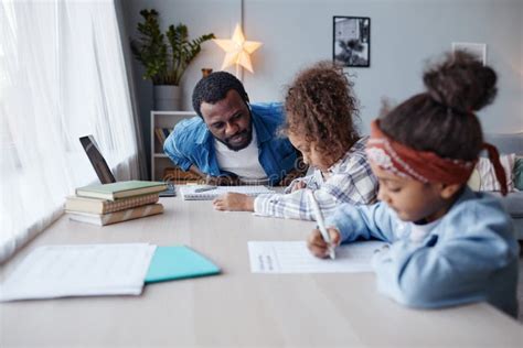 Father Helping Kids With Homework Stock Photo Image Of Homeschool