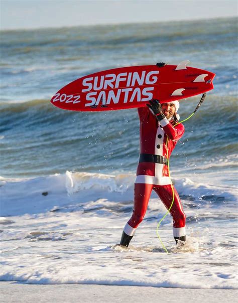 WATCH: 10,000 Surfing Santa Fans Storm Cocoa Beach On Frigid Christmas Eve Morning - Space Coast ...