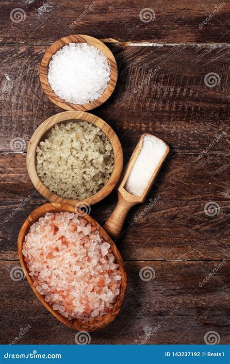 Sea Salt In Bowl Crystals Of Salt On Table And Himalayan Salt Stock