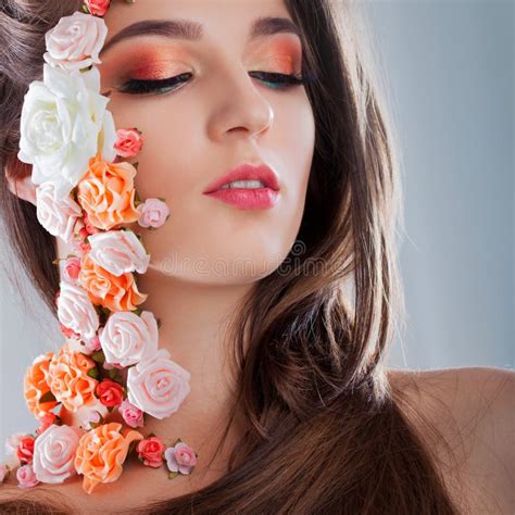 Beautiful Young Girl With Applique Flowers On The Face Stock Image