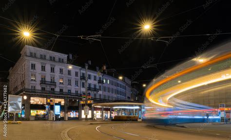 Light trails of a tram arriving at night at the square Paradeplatz in Zurich Stock Photo | Adobe ...