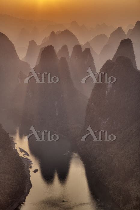 Limestone Karst Formations And River Li At Dawn Guilin Region