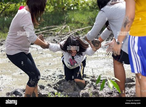 Girls Sinking In Mud