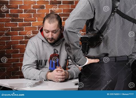 Police Officer Interrogates Detainee Stock Image Image Of Questioning