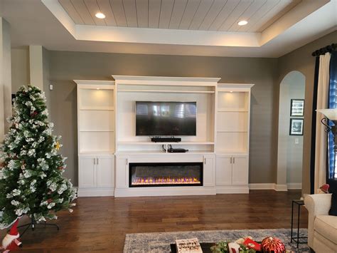 A Built In Entertainment Center With An Electric Fireplace Insert Just Finished R Carpentry