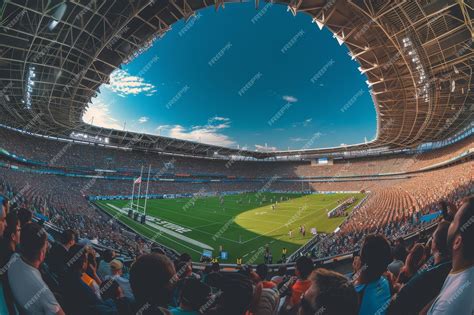 Premium Photo | A Large Stadium Filled With Crowds of People A ...