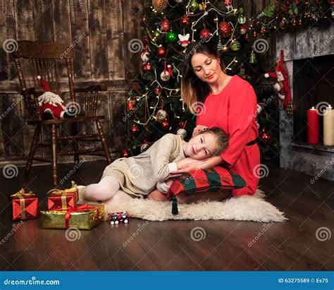 Mother And Daughter Near Christmas Tree Stock Image Image Of