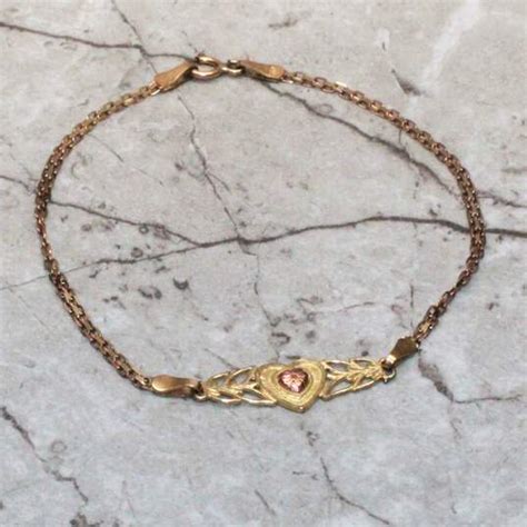 Buy The Oroamerica 10k Yellow And Rose Gold Heart Chain Bracelet 167g