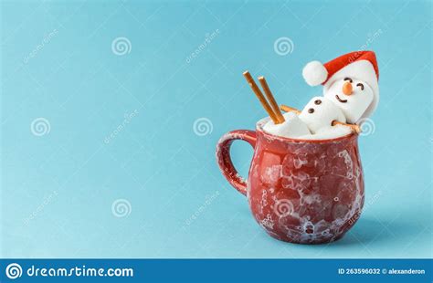 Marshmallow Snowman Taking Hot Tub In A Red Ceramic Cup Full Of Cocoa With Milk Foam Christmas