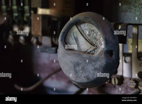 Detail Of An Old Ampere Meter With Broken Glass In Old Industrial Plant