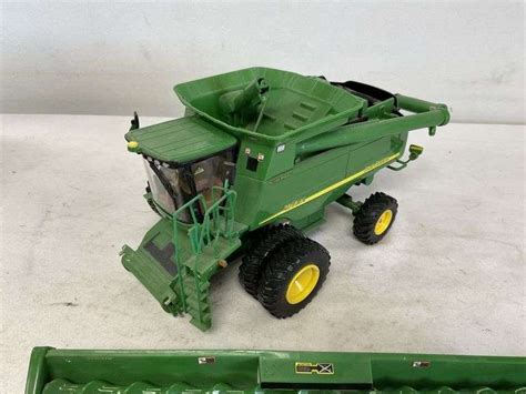 John Deere 9760 Sts Combine With Corn Head Legacy Auction Company