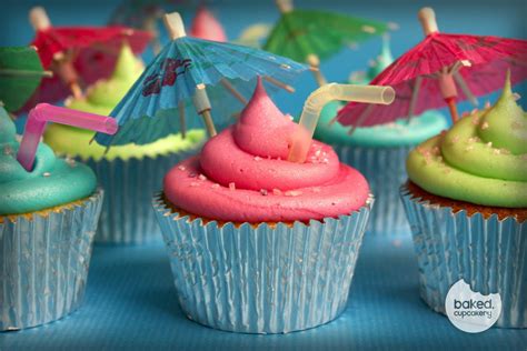 Cocktail Themed Cupcakes Complete With Straws And Umbrellas By Baked Cupcakery Themed Cupcakes