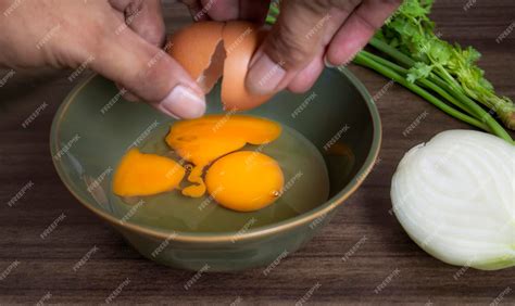 Premium Photo Fresh Natural Eggs In A Bowl With Hand Person And