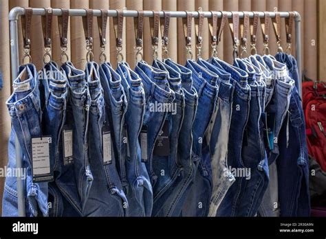 Finished Denim Trousers Are On Display At A Stall Of Bangladesh Denim