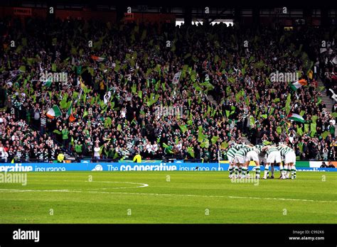 Celtic Players Perform Their Famous Huddle In Front Of Their Fans