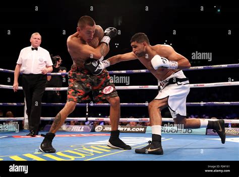 Amir Khan Right And Samuel Vargas In Action During Their Welterweight