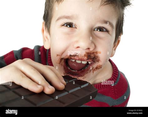 Smiling Kid Eating Chocolate Smeared Stained With Chocolate Lips