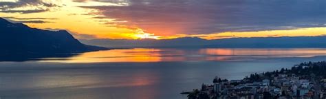 Premium Photo Scenic View Of Sunset Over The Leman Lake With Yellow