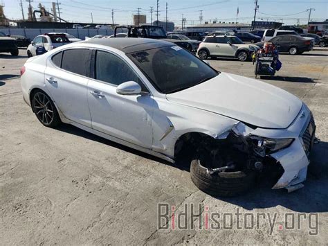 Report Kmtg44la3ku030699 Genesis G70 2019 White Gas Price And Damage