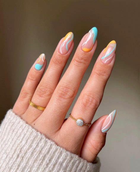 52 Cute Summer Nail Ideas Blue And Yellow Swirl Almond Nails