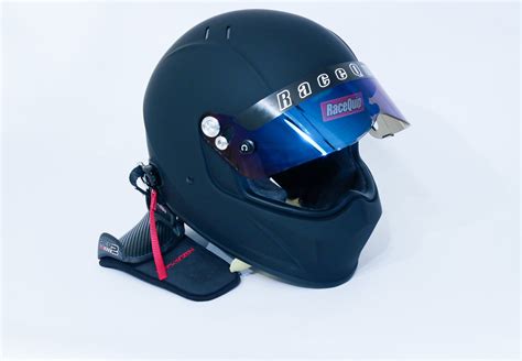 A Racequip Helmet And Necksgen Restraint Provides Safety Matched With Comfort