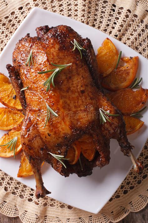 Delicious Roast Duck Oranges Rosemary Closeup Vertical Stock Photos