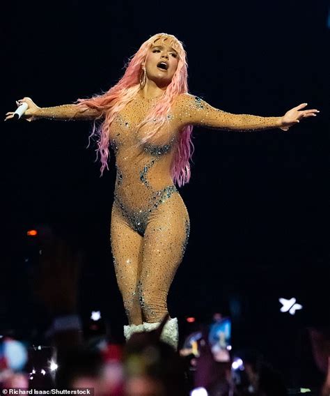 Karol G Flaunts Her Jaw Dropping Figure In A Dazzling Nude Catsuit As She Performs At The O