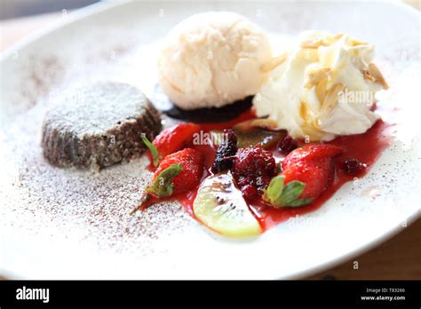 Chocolate Lava Cake with ice cream Stock Photo - Alamy