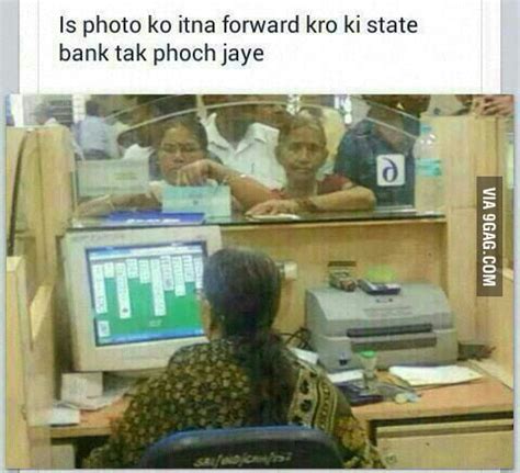 Indian Bank Employee Playing Solitaire When There Is A Long Queue