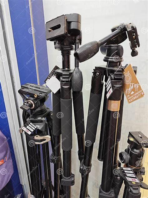 Various Type Of Big And Small Photography Tripods On Displayed And Sale