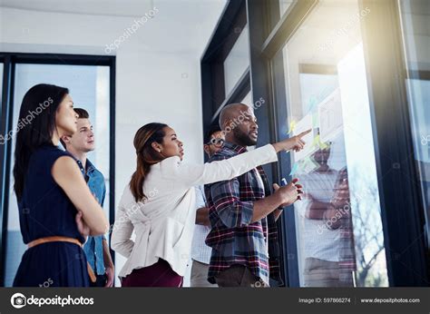 Hes Got Every Point Interest Covered Young Businesswoman Giving Demonstration Stock Photo by ...