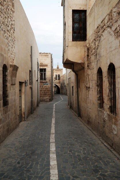 Premium Photo Empty Alley Amidst Buildings In City