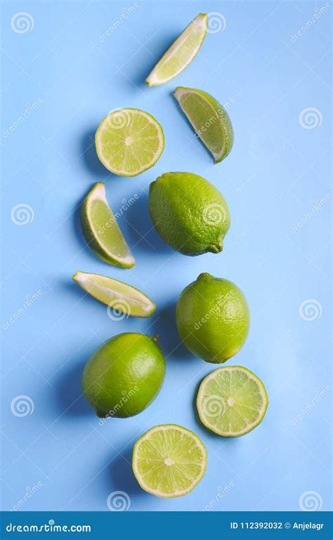 Fresh Limes On Light Blue Background Stock Photo Image Of Lime