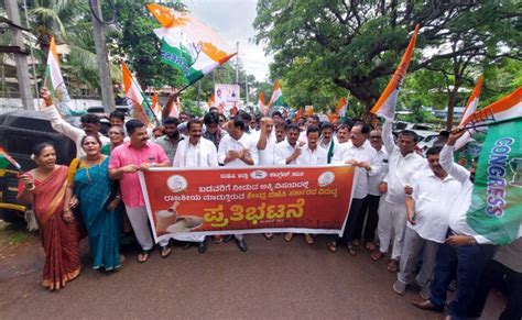 Cong Bjp Spar Over Rice Supply To Karnataka Ex Cm Bommai Detained