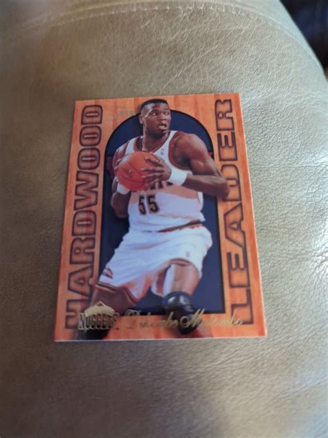 Dikembe Mutombo 1995 96 Fleer Flair Hardwood Leader 7 Denver Nuggets