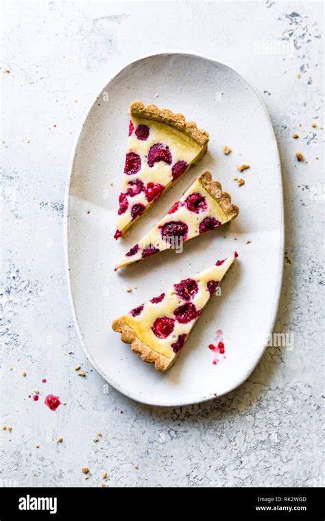 Raspberry Custard Tart Stock Photo Alamy