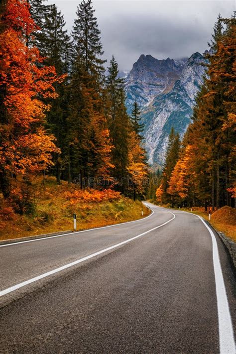 Mountain Road Landscape With Rocks Sunny Sky With Clouds And