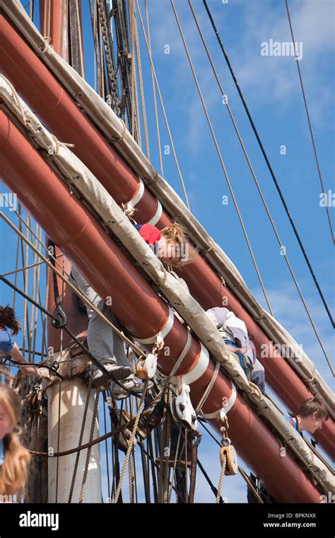 Sailors And Participants Working The Rigging And Sails At The 2010 Tall