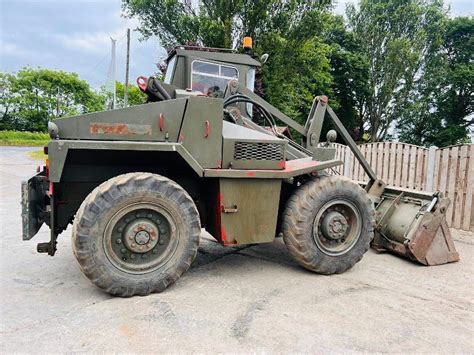 MUIR HILL A5000 4WD LOADING SHOVEL EX MOD C W BUCKET AND TINES VIDEO