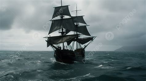 Black Sailing Ship Out In The Water On A Dark And Overcast Day