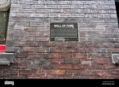 the wall of fame listing people who played at the cavern club in ...