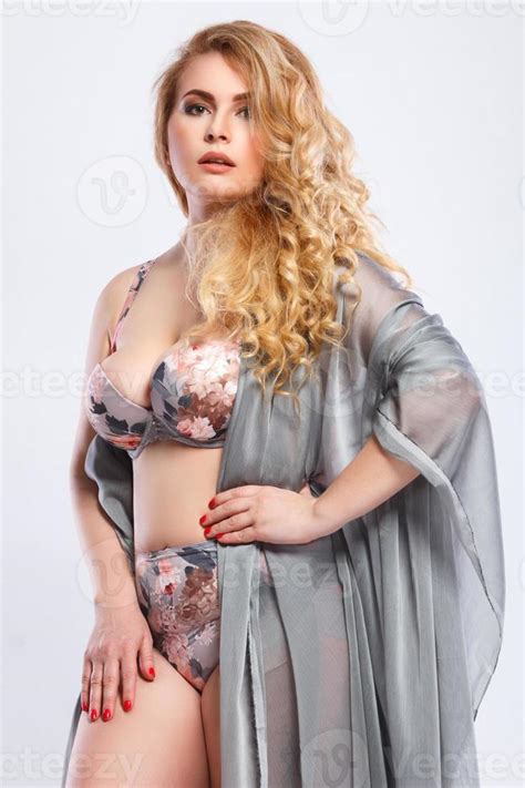 Beautiful Plus Size Model Wearing Lingerie And Piece Fabric Stock Photo At Vecteezy