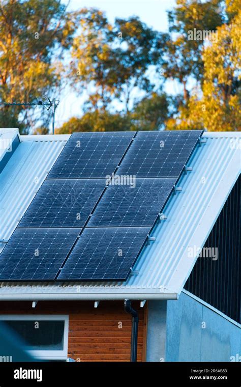 Photovoltaic Pv Solar Panels On House Roof In Icy Cold Weather