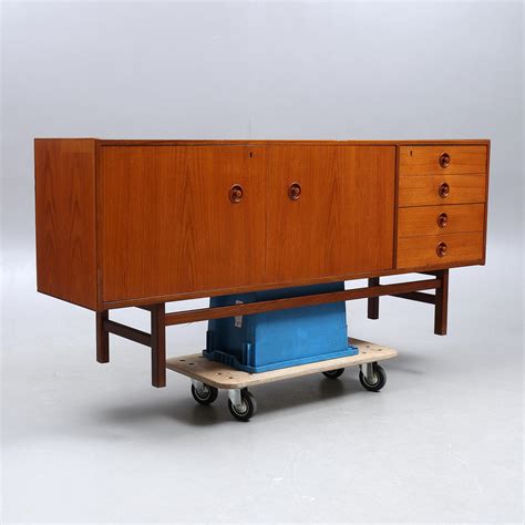 SIDEBOARD 1960 tal luckor med bakomliggande hylla samt 4 lådor fanér