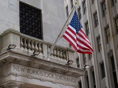 Wall Street abre al alza tras digerir decisión de la Fed sobre las tasas