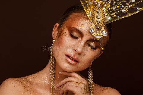 Portrait Of A Beautiful Woman With Expressive Creative Make Up In