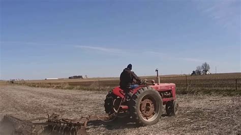 1947 Farmall H Pulling A 10 Disc Youtube